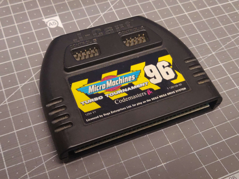 File:Codemasters Sega Mega Drive Cartridge with Controller ports.png